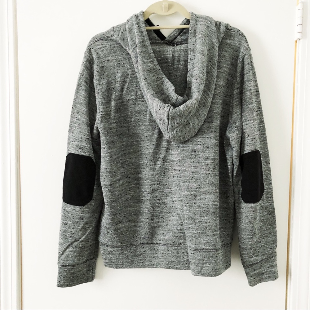 Grey hoodie with black elbow patches